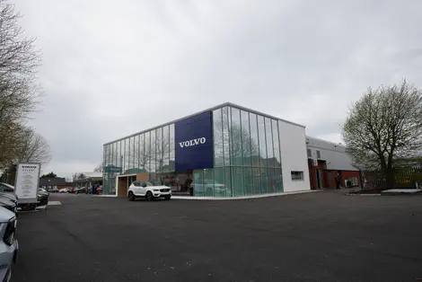 Image of Volvo Worcester showing the dealership and car park for customers.
