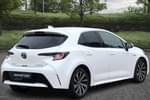 Image two of this 2022 Toyota Corolla Hatchback 1.8 VVT-i Hybrid Design 5dr CVT in White at Listers Toyota Cheltenham