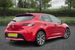 Image two of this 2023 Toyota Corolla Hatchback 1.8 VVT-i Hybrid Design 5dr CVT in Red at Listers Toyota Stratford-upon-Avon